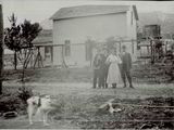Grunig_Family_in_front_of_ranch_house.jpg