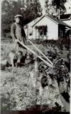 Grunig_s_Foster_Son_near_ranch_house.jpg